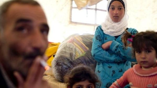 عائلة سورية مشردة