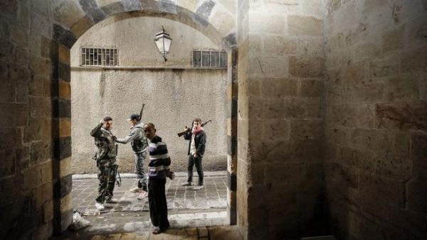 مقاتلون من المعارضة في حلب/أ.ف.ب