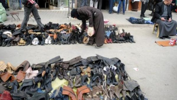 سوق شعبي للاحذية المستعملة في حلب/ا.ف.ب