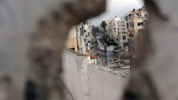 شارع في صلاح الدين/حلب/ بسواتر للوقاية من القناصة/أ.ف.ب