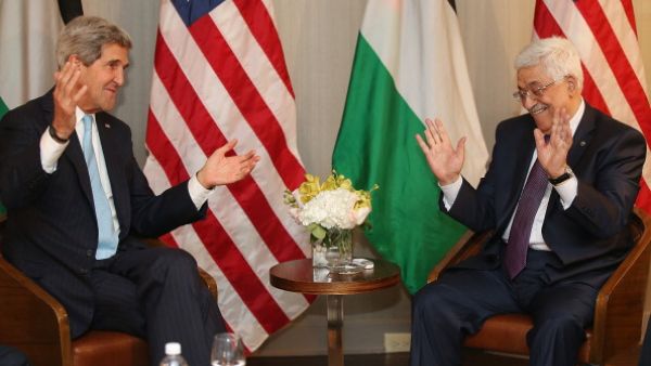 Secretary of State John Kerry with Palestinian Authority President Mahmoud Abbas. [Mario Tama/Getty Images]