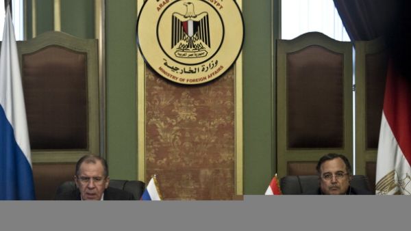 Egyptian Foreign Minister Nabil Fahmi ( and his Russian counterpart Sergey Lavrov give a press conference on November 14, 2013 in the Egyptian capital, Cairo. Sergei Lavrov and Russian Defence Minister Sergei Shoigu hold talks with Egyptian counterparts on weapons sales and political relations during an official visit. [AFP]