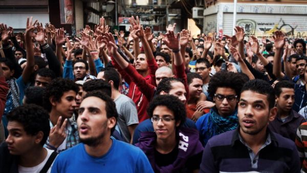 Demonstrators in downtown Cairo mark the second year anniversary of Mohamed Mahmoud. [GIANLUIGI GUERCIA/AFP/Getty Images]