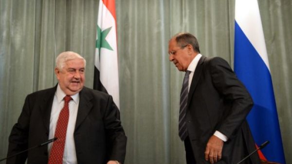 وزيرا خارجية روسيا سيرغي لافروف وسوريا وليد المعلم خلال المؤتمر الصحفي بموسكو/أ.ف.ب