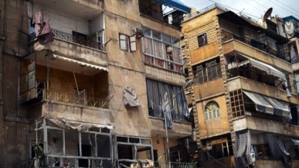 مبان مدمرة في حي الشيخ مقصود بحلب/أ.ف.ب