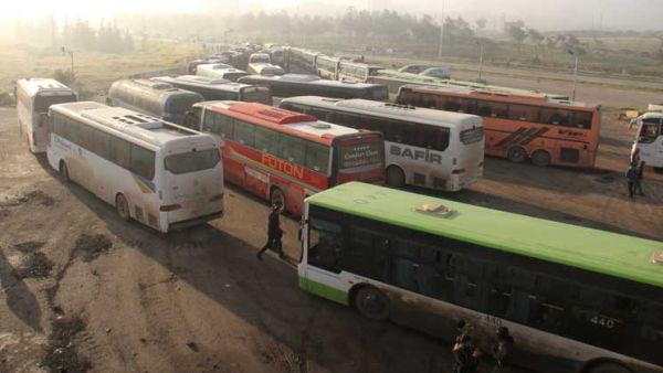 إجلاء مجموعة من مقاتلي تنظيم الدولة الإسلامية من آخر جيب للمعارضة قرب العاصمة دمشق