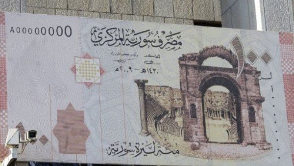 مشروع قانون يقضي بتجريم كل من يتعامل بغير الليرة السورية