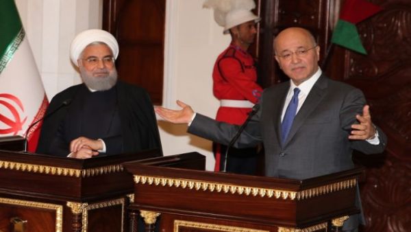 الرئيسان العراقي برهم صالح والإيراني حسن روحاني