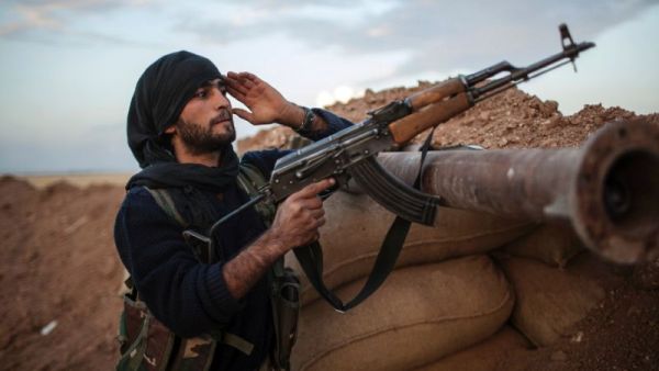 A Kurdish YPG fighter holds a position in northern Syria. (AFP/Fabio Bucciarelli)