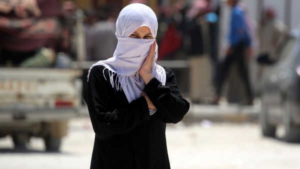 In a camp for the displaced in the town of Ain Issa, 50 kilometres (30 miles) north of Raqa, waves of people arrive every hour. (AFP) 