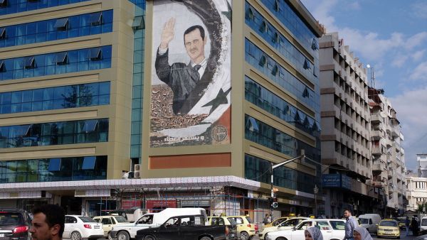 Mural of Syrian President Bashar al-Assad in Latakia (Wikimedia Commons)