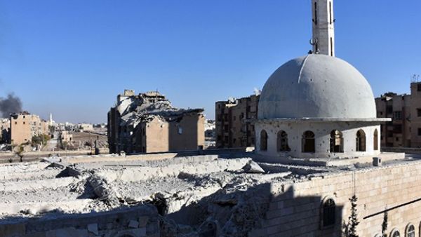 A damaged mosque stands in the Masaken Hanano district in eastern Aleppo, a day after Syrian pro-government forces seized it from rebel fighters (AFP/George Ourfalian)