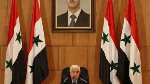 Syrian foreign minister Waleed Muallem speaks at conference in Damascus. (AFP) 