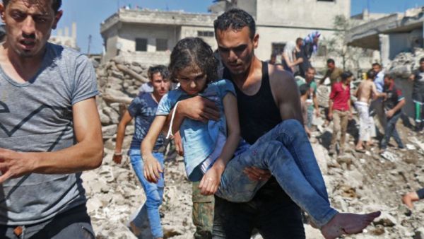 SNC Urges international community to denounce the crimes against Syrians committed in the southwestern Daraa. (AFP/Ahmad al-Msalam)