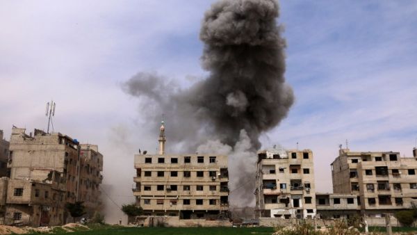 Smoke billows following an airstrike on Ain Tarma, in the eastern Ghouta area, a rebel stronghold east of the capital Damascus on March 27, 2017. (AFP/Mohammed Eyad)