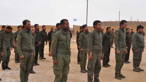 Cadets from the Interior Security Forces of Raqqa, the first police force formed by the international coalition in charge of maintaining order in Syria's northern Raqa province, take part in a training in the courtyard of a school in Ain Eissa, some 50 kilometres north of Raqqa on May 23, 2017. (AFP/Ayham al-Mohammed