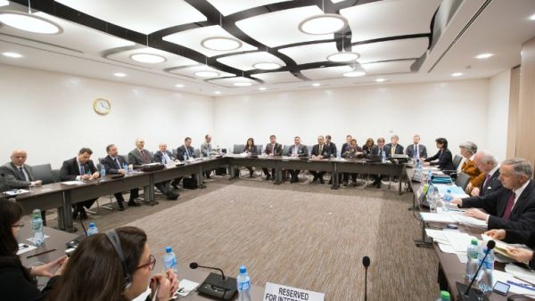 The meeting between Syrian government delegation and UN Syria envoy Staffan de Mistura, during Syria peace talks, at the United Nations Office in Geneva. (AFP/Xu Jinquan)