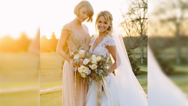 Reem Acra designed the bride's dress and the blush dresses for the bridesmaids. (Instagram/Reem Acra)