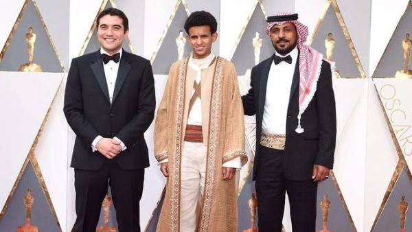 Theeb's director Naji Abu Nowar and cast on the Oscars red carpet. (Facebook)
