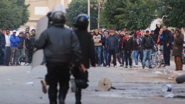 Police approach protesters in Kasserine, Tunisia. (AFP/Mohamed Khalil)