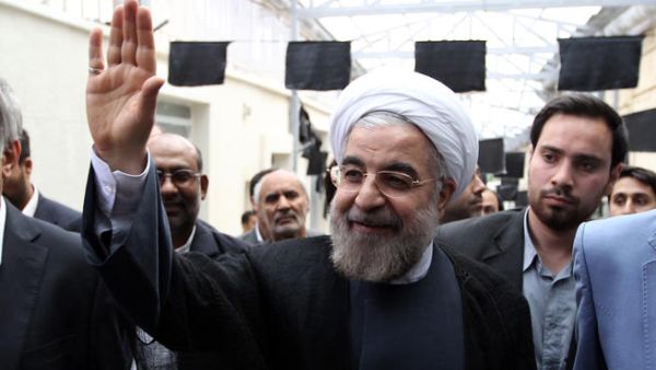 assan Rowhani, a moderate Iranian presidential candidate and former top nuclear negotiator, waves as he arrives for to campaign at the Jamaran mosque in Tehran, on June 1 (Atta Kenare/ AFP)
