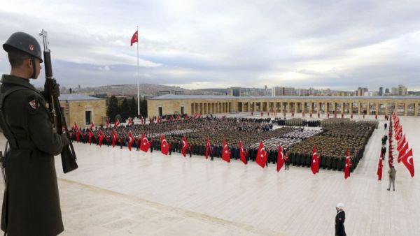 A Turkish Armed Forces officer (L) stands during a ceremony marking the 78th anniversary of the death of founder of the Republic of Turkey Mustafa Kemal Ataturk, at the mausoleum of Anitkabir in Ankara, on November 10, 2016. (AFP/Adem Altan)