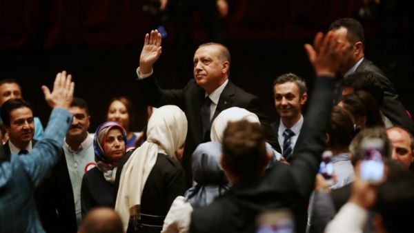 Turkish President Recep Tayyip Erdogan waves to supporters during a ceremony marking the last year's failed coup. (Adem Altan/AFP)