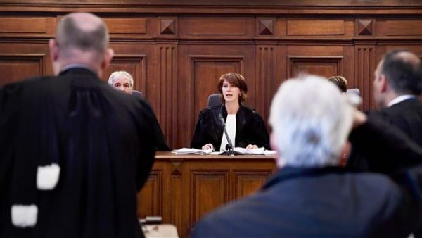 A judge speaks during the so-called "Conrad princesses" trial in front of the Brussels criminal court for human trafficking on May 11, 2017. (AFP)