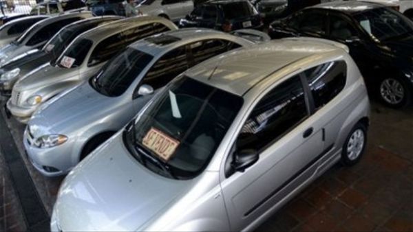 A visitor has been imprisoned for selling 43 cars using forged registration papers. (AFP/ File Photo)