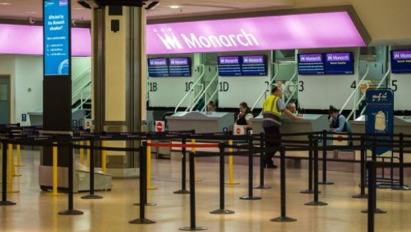 Checking out of checking in: An empty Monarch Airlines departures area at Birmingham airport, England. (AFP/ File)