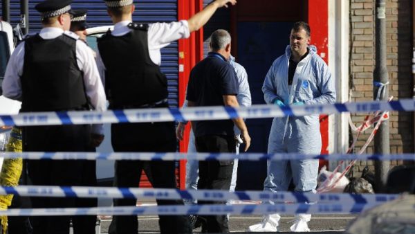 Forensic officers work at the scene in Finsbury Park area of north London after a vehichle hit pedestrians, on June 19, 2017. A van ploughed into pedestrians near a London mosque in early Monday, killing one man and injuring eight other people in what Prime Minister Theresa May said was "a potential terrorist attack".(Tolga Akmen/AFP)