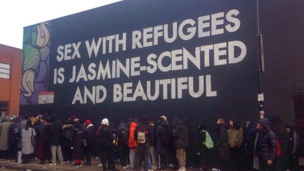 A piece of street art containing the phrase “sex with refugees is jasmine-scented and beautiful” in large letters has caused controversy after it appeared in London over the weekend (Twitter)