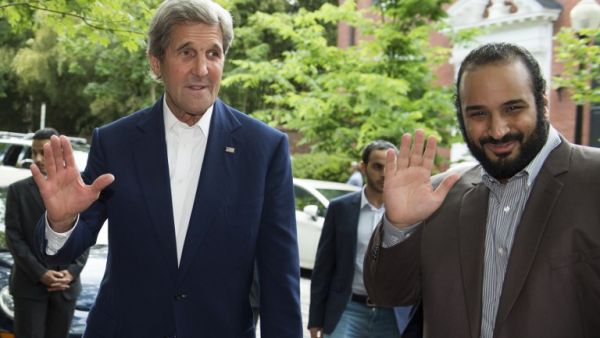 US Secretary of State John Kerry (L) greets Saudi Deputy Crown Prince Mohammed bin Salman outside Kerry's residence prior to their meeting on June 13, 2016, in Washington, DC. (AFP/Molly Riley)
