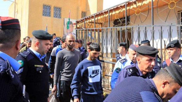 Scores of inmates were released on Tuesday as the 2018 General Pardon Law went into effect. Officials said the releases would continue until the law is fully implemented. (Petra photos)