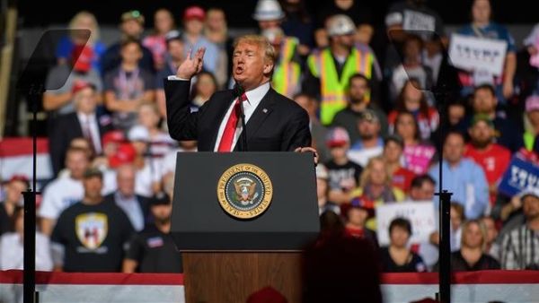 US President Donald Trump speaks to supporters at his rally inside the WesBanco Arena on September 29, 2018 in West Virginia. (AFP/ File Photo)
