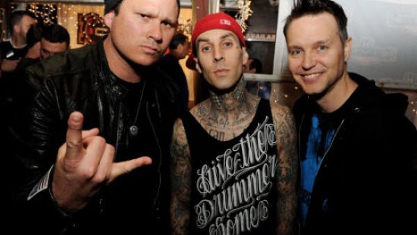 Former Blink-182 guitarist Tom DeLonge has hinted he could be set to return to the band after holding talks with drummer Travis Barker. /AFP