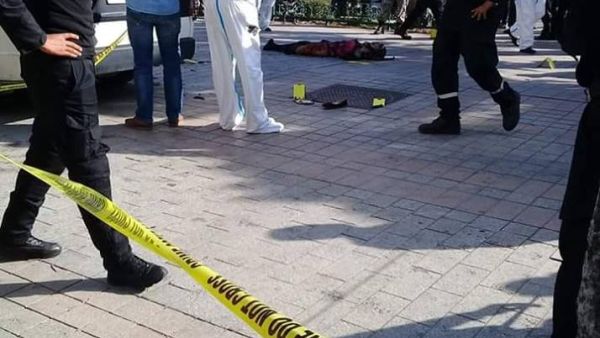 At the scene where a woman blew herself up in central Tunis.  (Twitter)