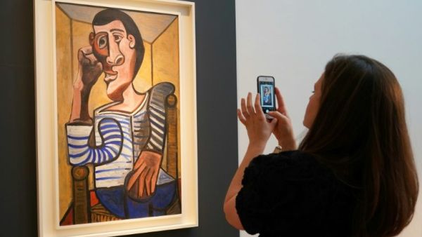 Christie's said that Le Marin painting by Spanish artist Pablo Picasso was damaged during the preparation of the auction. (AFP/ File Photo)