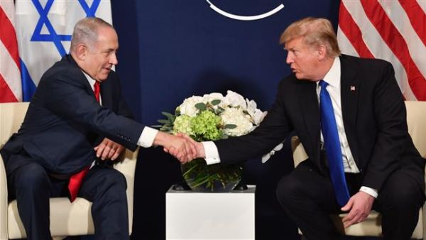 US President Donald Trump (R) shake hands with Israeli Prime Minister Benjamin Netanyahu. (AFP/ File Photo)
