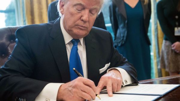 Trump signed another executive action Friday to bolster military spending and, according to the president, "begin the great rebuilding of the armed services of the United States". (Twitter)