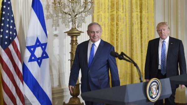 US President Donald Trump and Israel's Prime Minister Benjamin Netanyahu take arrive for a joint press conference in the East Room of the White House on February 15, 2017 in Washington, DC. (AFP/Mandel Ngan)