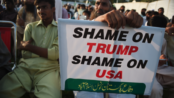 Supporters of the Pakistan Defense Council, an alliance of hardline Islamist religious leaders and politicians, gather during an anti-U.S protest in Islamabad on August 27, 2017. | AFP