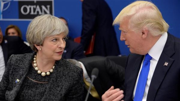 US President Donald Trump and British Prime Minister May have recently discussed the Russian diplomatic expulsion during a phone call. (AFP/ File Photo)