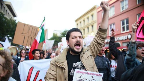 Anti-Donald Trump demonstrators chant during a rall on March 12, 2018 in San Diego, California. (AFP/ File Photo)