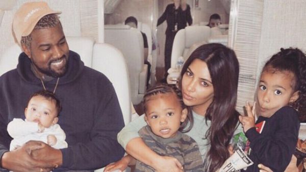 Kim Kardashian and Kanye West with children (Twitter)