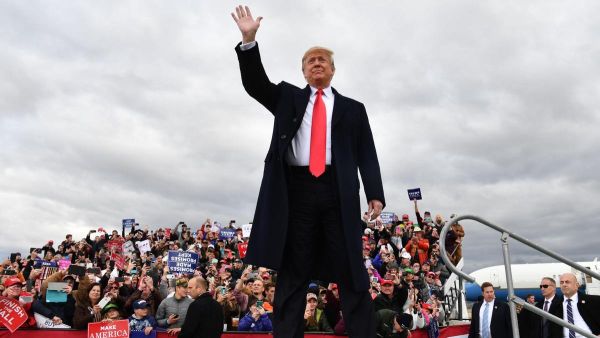 US President Donald Trump arrives for a rally at Bozeman Yellowstone International Airport in Montana. (AFP)

