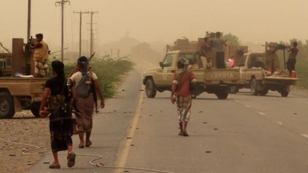 Yemeni pro-government forces gather at the south of Hodeida airport, in Yemen's Hodeida province. (AFP Photo)