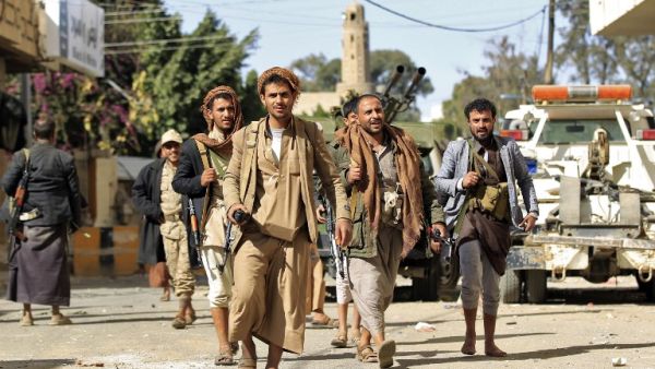 Houthi rebel fighters are seen outside of the residence of Yemen's former President Ali Abdullah Saleh in Sanaa on December 4, 2017. (Mohammed Huwais/AFP)