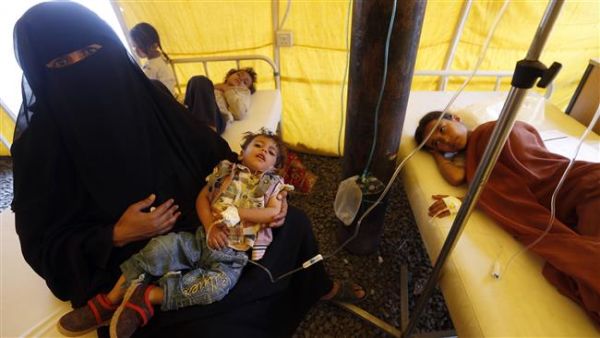 Yemeni children suspected of being infected with cholera receive treatment at a makeshift hospital in Sana'a on June 5, 2017. (AFP)
