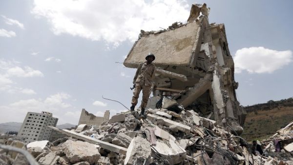 A building destroyed after a Saudi-led airstrike on Yemen's capital Sanaa (AFP)